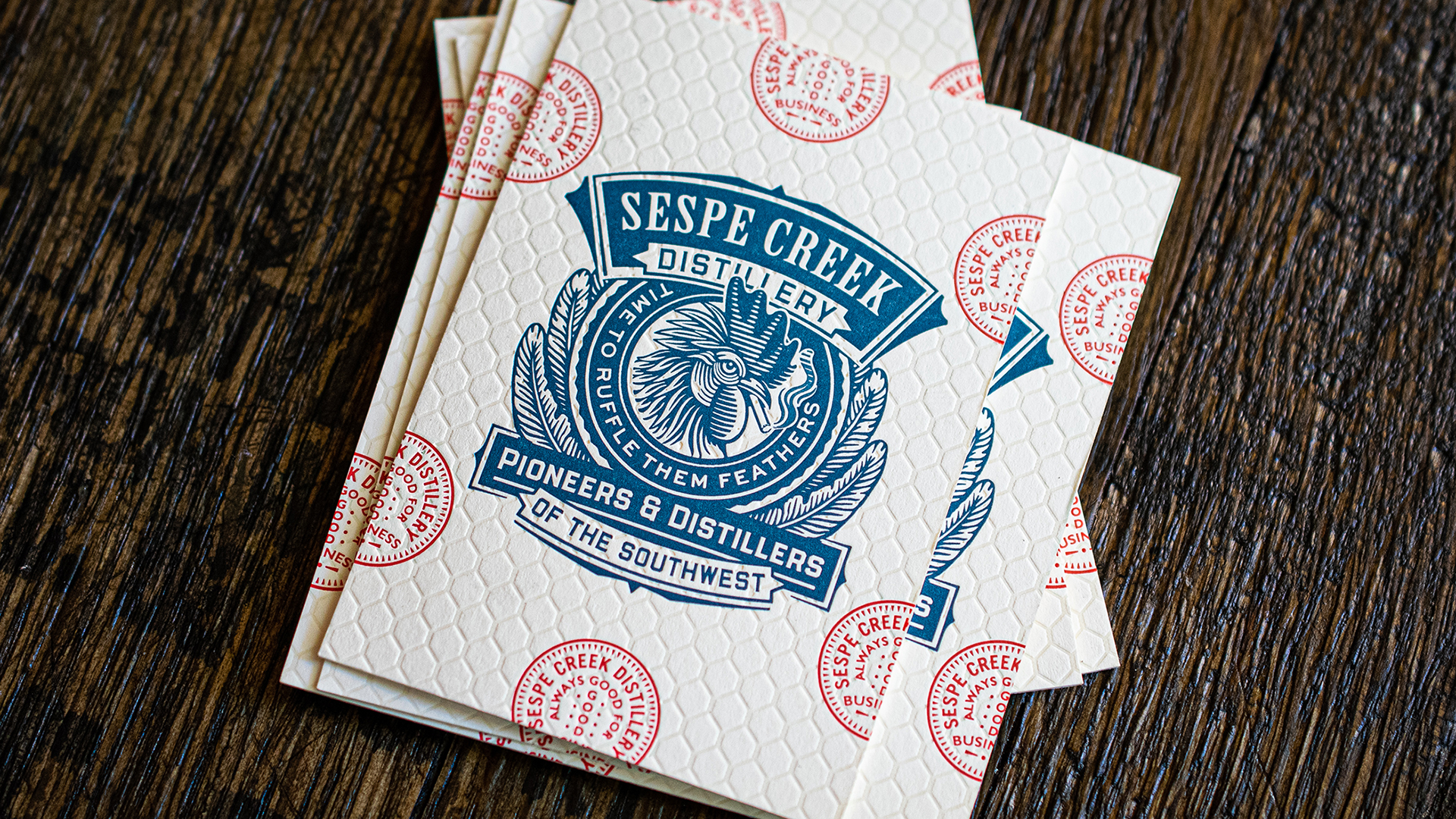 Good example of letterpress and debossing techniques on business cards from Sespe Creek Distillery designed by Chad Michael Studio